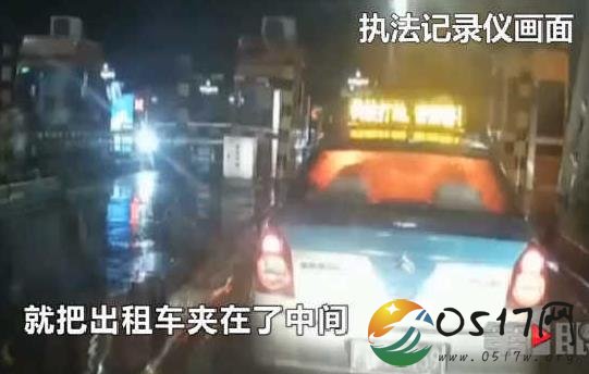 出租车顶灯显被打劫 原来是乌龙让人虚惊一场